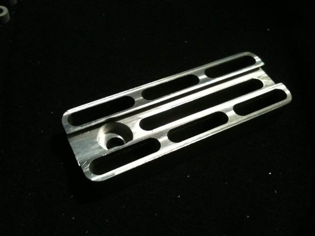 Slotted machined aluminium component